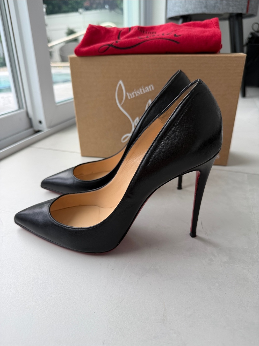 Christian Louboutin Black Leather Pointed Toe Stiletto Heels with Red Soles